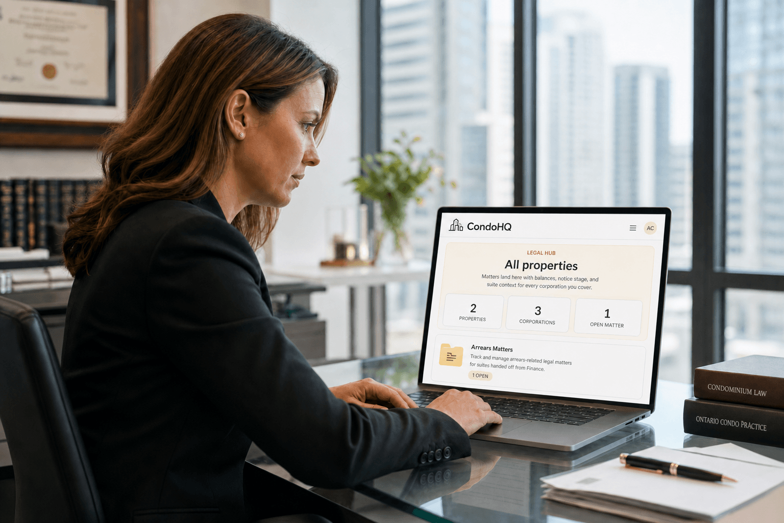 Corporation counsel reviewing the CondoHQ Legal Hub on her laptop in a modern law office